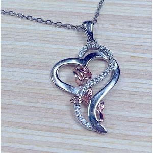 Heart shaped necklace with rose
